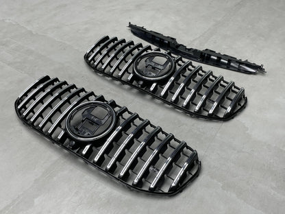 Angled view of the direct replacement AMG Panamericana front grille assembly for Mercedes GLS450 and GLS580 X167, showcasing the mounting tabs and sensor cutouts.
