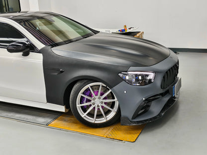 Side view profile of Mercedes Benz W213 C238 E-Class Coupe showing custom widebody fender flares